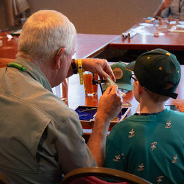 Attendees both young and old participated in the fly tying lessons at the Fly Fishing Film Festival panel
